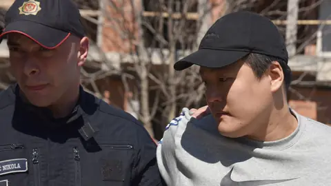 Police officer with Do Kwon in Podgorica, March 2023
