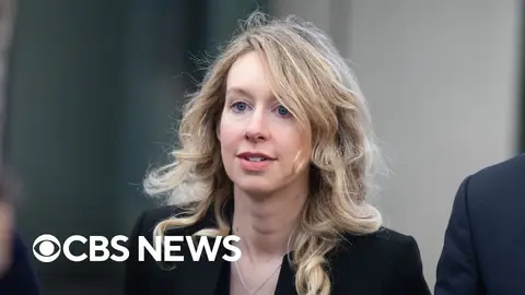 CBS report on the day Holmes reported to prison in Texas