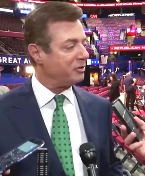 Manafort, as Trump campaign chairman, talking to reporters at the Republican National Convention, 17 July 2016