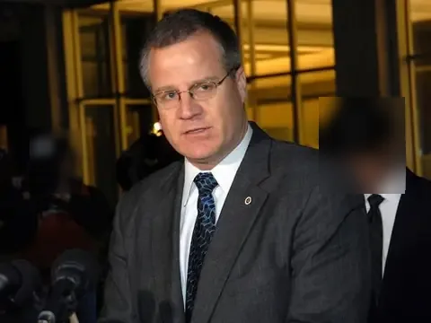 Assistant US Attorney John Marti speaks to reporters after the jury convicted Petters on all 20 counts