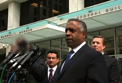 US Attorney B. Todd Jones, with FBI Minneapolis chief Ralph Boelter (right) and acting IRS special agent Julio La Rosa (left), after the 50-year sentence