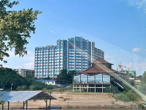 Shwe Kokko's tower blocks on the Moei River, seen from the Thai bank