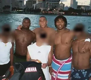 D.J. Williams, Kellen Winslow Jr. and Benard Thomas on the back of Shapiro's yacht in Biscayne Bay